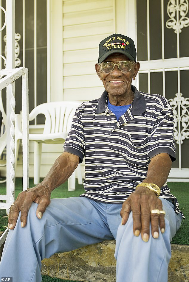 Overton celebrating his 107th, said that one secret to his long life was smoking cigars and drinking whiskey, which he often was found doing on the porch of his Austin home