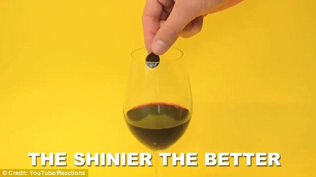 Drop the clean penny into a glass of wine and stir it around for several minutes