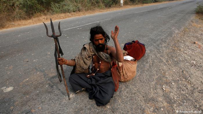 A snake charmer in Baghpur, in the central state of Uttar Pradesh, (Reuters/A. Abidi)